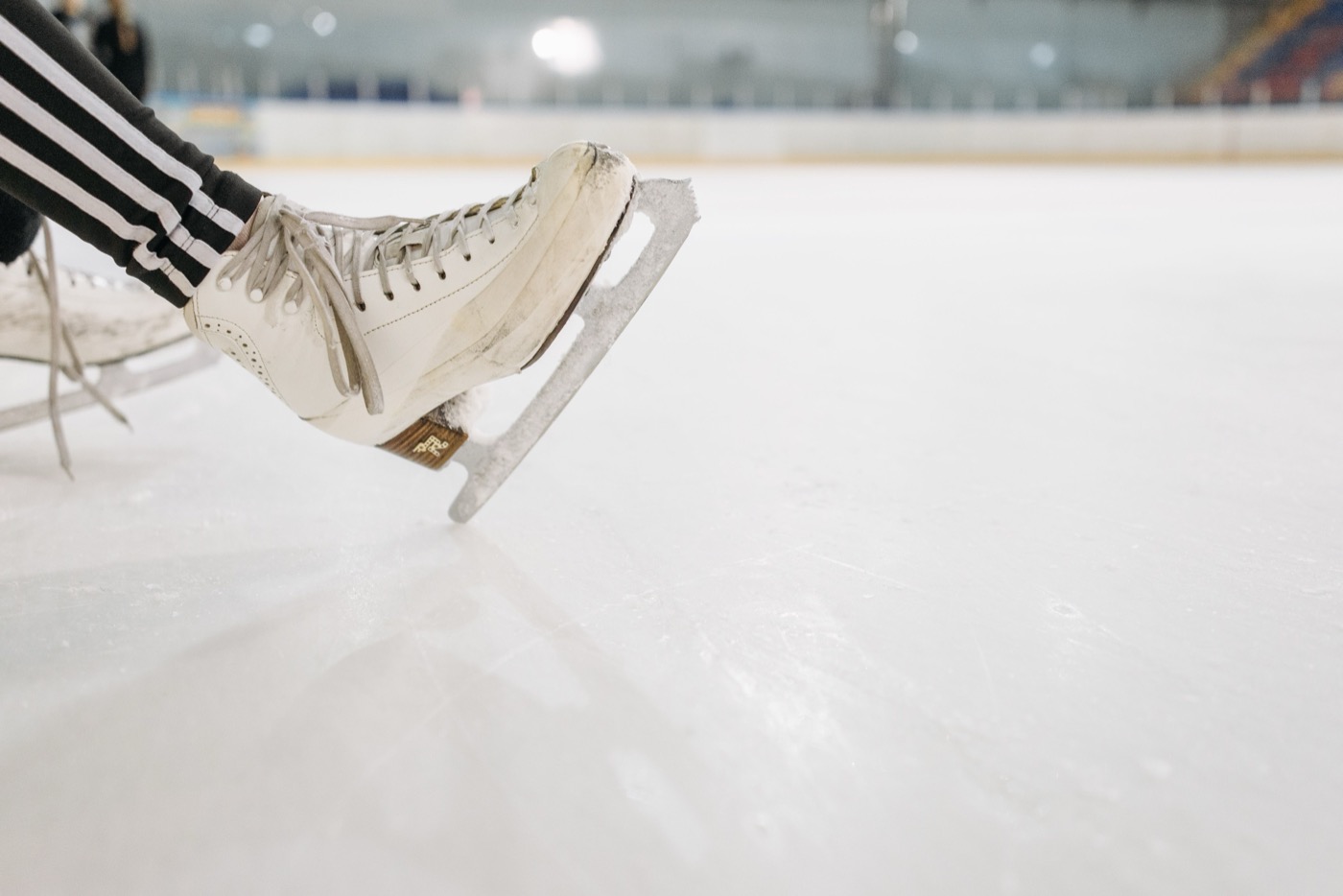 Ice skates on a rink — a voucher-style advent calendar door idea